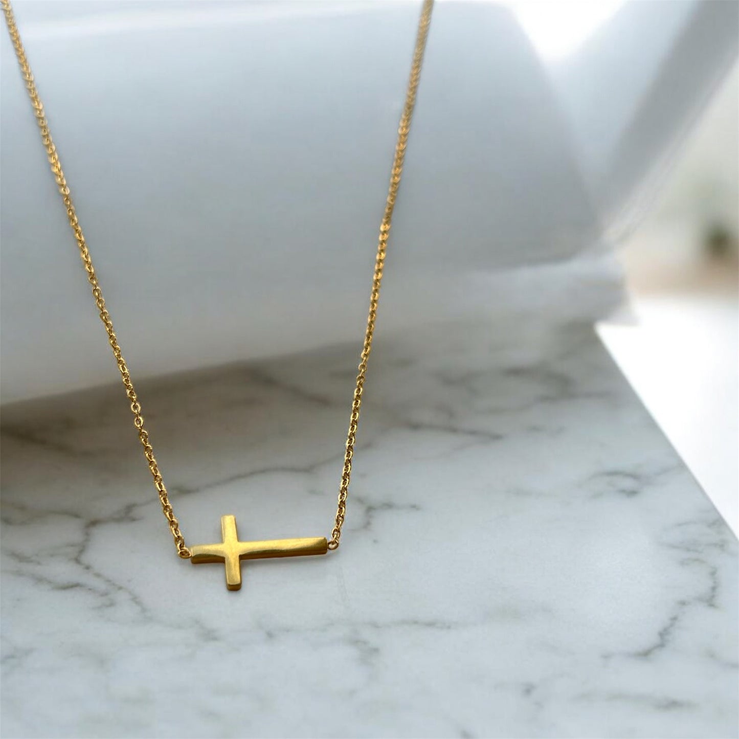 Sideway cross gold necklace